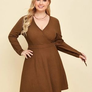 NWOT. Fit and flare wrap dress.